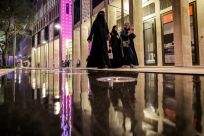 While the Muslim veil is not compulsory in Qatar, women must dress 'modestly', covered from the shoulders to knees