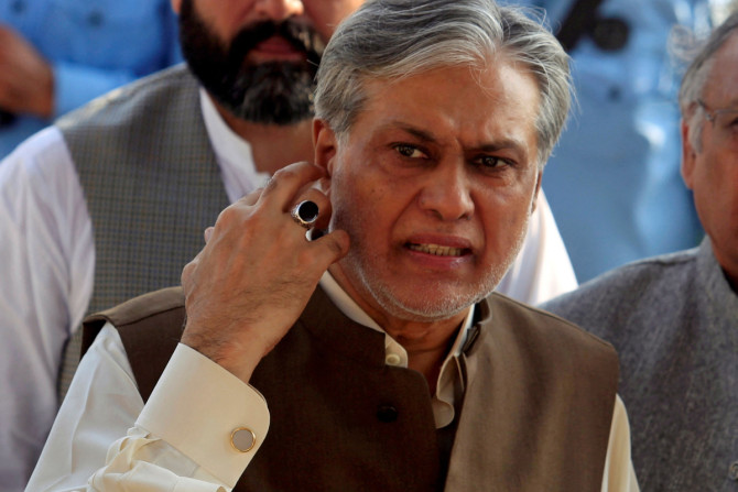 Pakistan's Finance Minister Ishaq Dar is seen after a party meeting in Islamabad