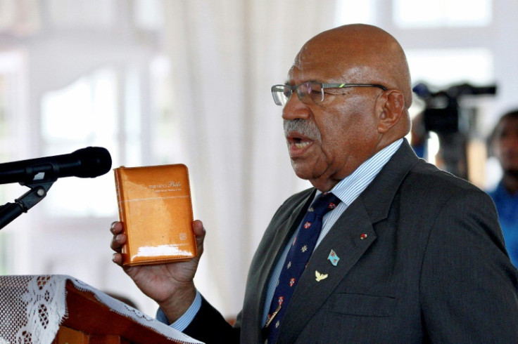 Sitiveni Rabuka, a former Fijian rugby international, was sworn in as prime minister after a secret ballot in parliament where he won by 28 votes to 27