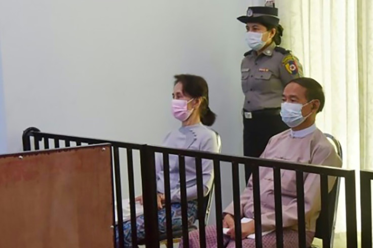 Since the coup, Aung San Suu Kyi (L) has largely disappeared from public view, seen only in grainy state media photos from the bare courtroom