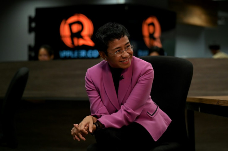 Nobel laureate Maria Ressa told AFP she keeps a prison "go bag", bundles of cash for bail, and runs simulations of police raids with her staff as she fights for press freedom in the Philippines