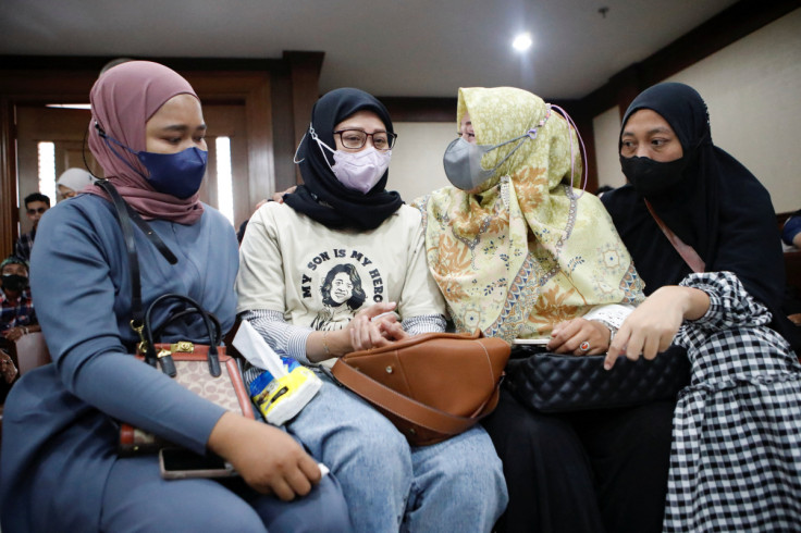 Preliminary hearing for a class-action lawsuit filed against the Indonesian government and drug companies for allowing the sale of tainted cough syrup at the court in Jakarta