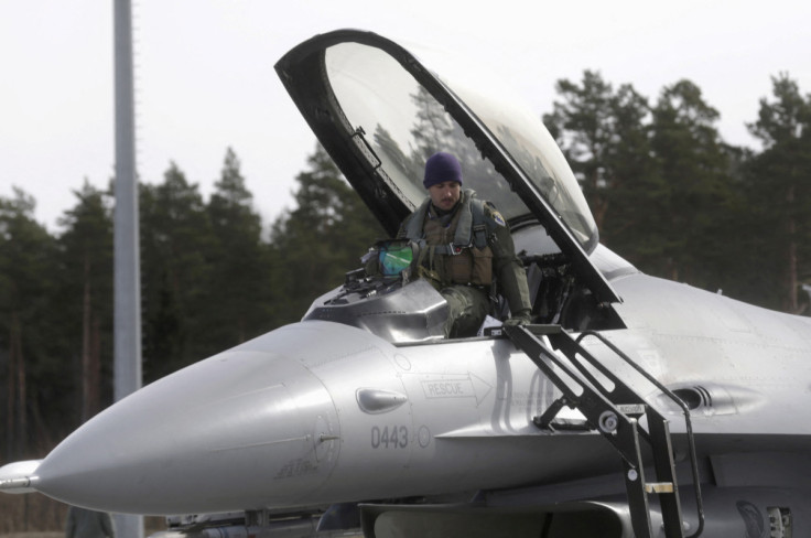 U.S. Air Force 510th Fighter Squadron pilot leaves his F-16 fighter in Amari air base