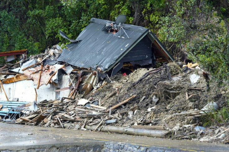 Tens of thousands of homes in New Zealand were without power Monday and hundreds of flights have been cancelled as a tropical storm lashes the north of the country