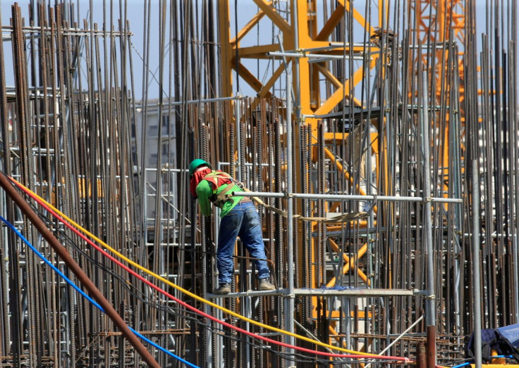 A worker installs steel rods at a construction site in Paranaque city, metro Manila, Philippines May 29, 2018. 