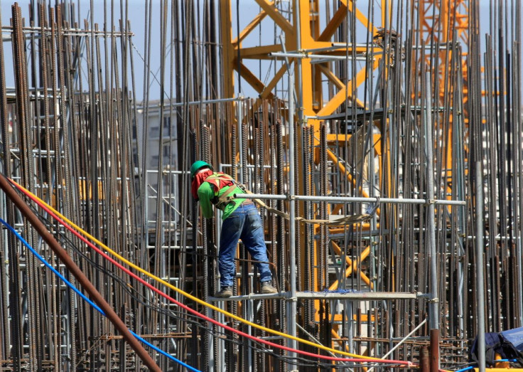 A worker installs steel rods at a construction site in Paranaque city, metro Manila, Philippines May 29, 2018.