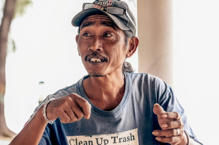 "I live in worry. I fear that when I am asleep, the water will suddenly rise," says Arif Pujianto