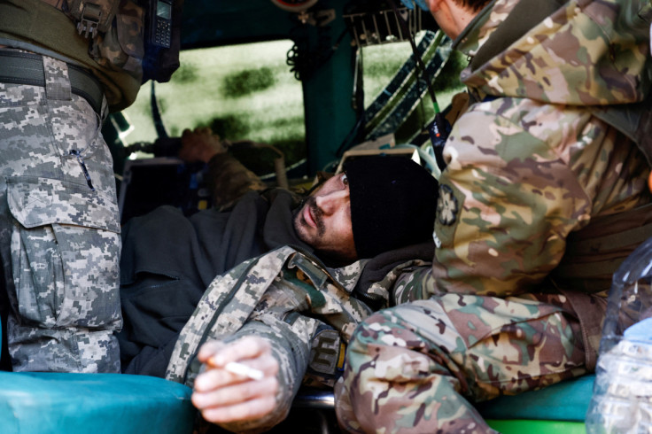 Military medics treat wounded Ukrainian soldier at eastern front line
