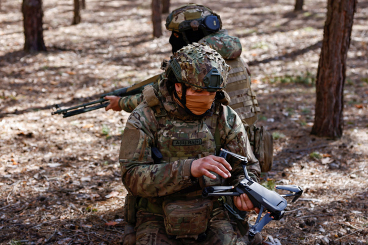 Ukrainian servicemen of the 110th Battalion take part in an exercise near the frontline town of Kreminna