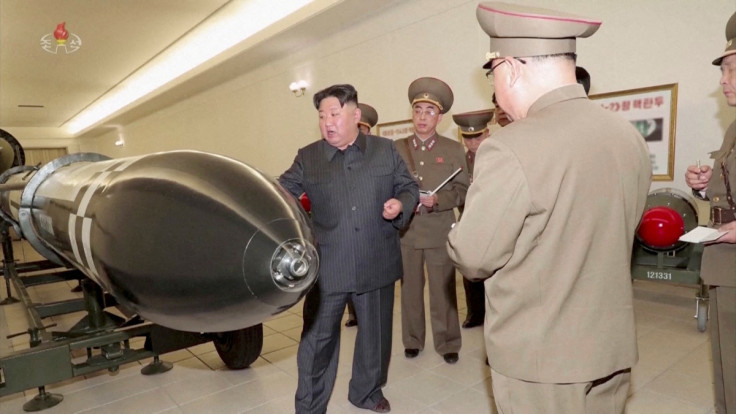 North Korean leader Kim Jong Un inspects nuclear warheads at an undisclosed location