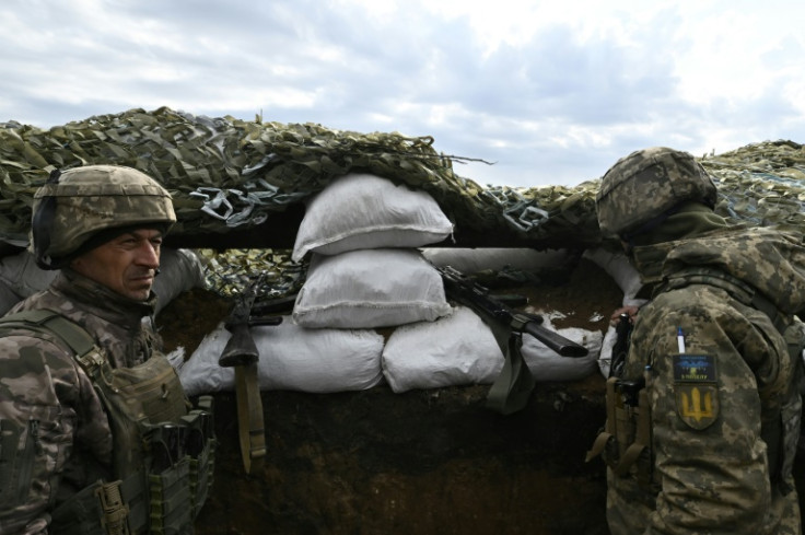 Ukrainian troops in trenches near the battleground city of Bakhmut on April 8, 2023