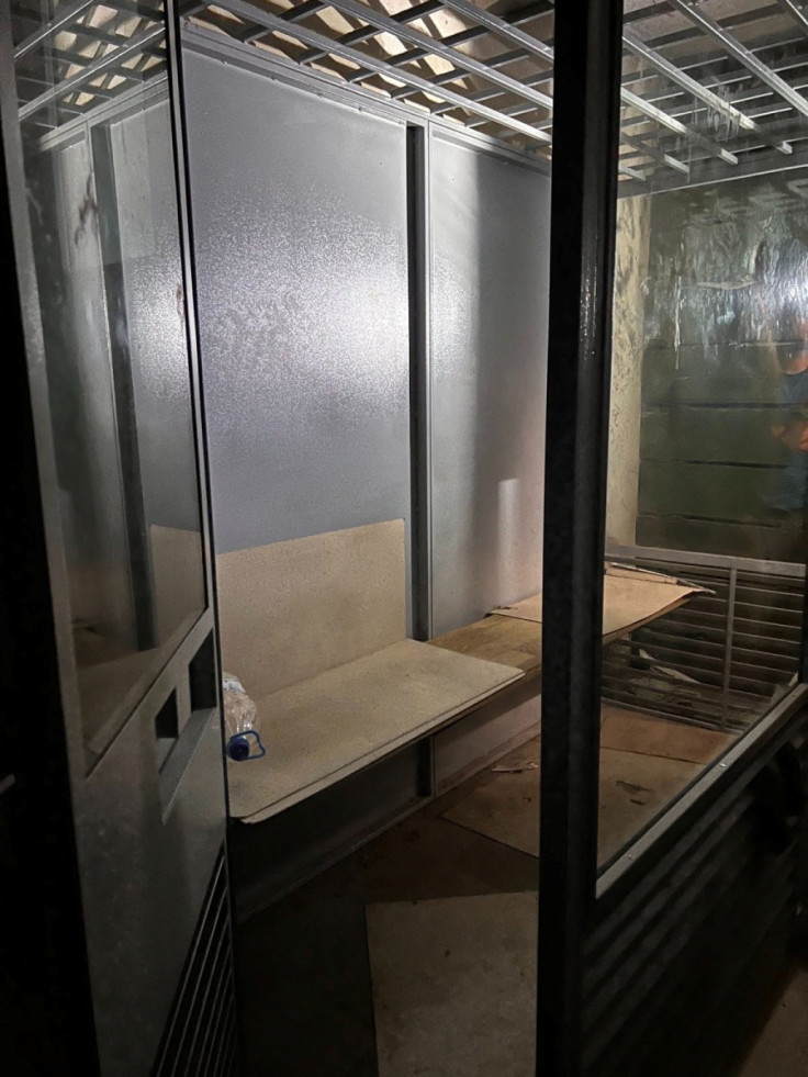 A glass and metal cage in the basement of a publishing house in Balakliia