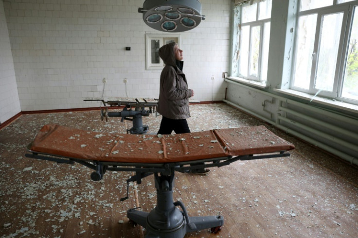 'The buildings were destroyed a long time ago,' says Ukrainian nurse Elena who remains at the hospital and hands out medicine if people come