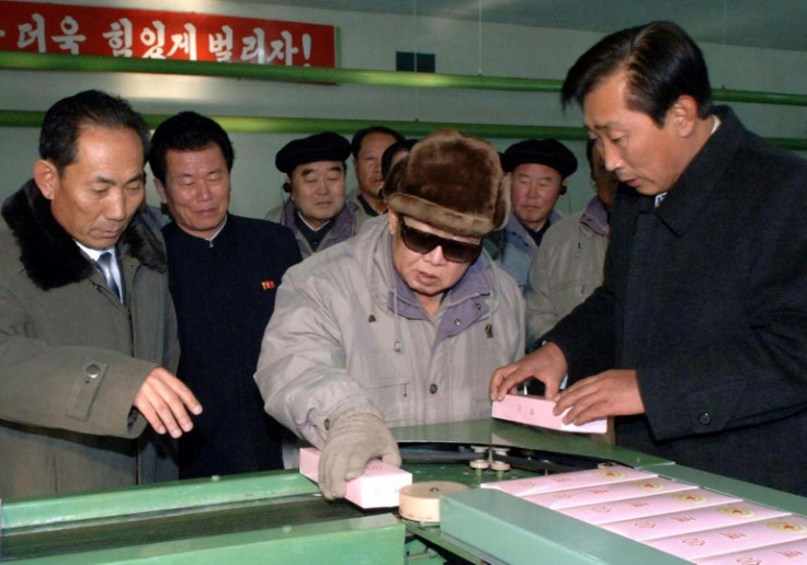 Late North Korean leader Kim Jong-Il visiting a tobacco factory in 2010