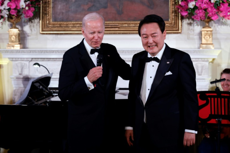 US President Joe Biden (L) hosted a state dinner in honor of South Korean President Yoon Suk Yeol (R) at the White House