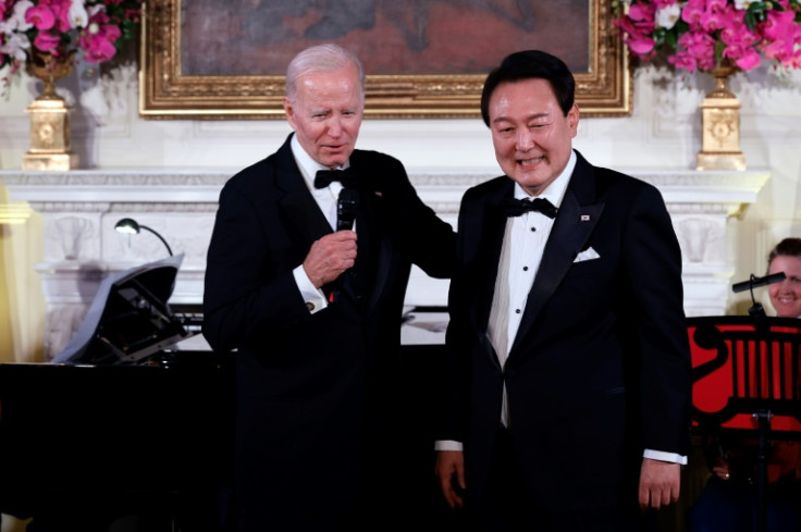 US President Joe Biden (L) hosted a state dinner in honor of South Korean President Yoon Suk Yeol (R) at the White House