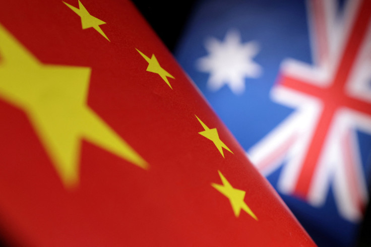 Illustration shows printed Chinese and Australian flags
