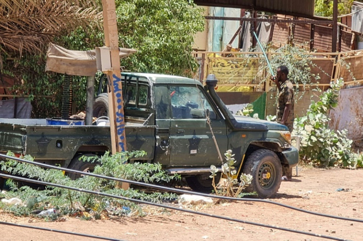 Security forces affiliated with the Sudanese Army man a position in Khartoum's Jabra neighbourhood