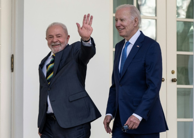 US President Joe Biden and Brazilian President Luiz Inacio Lula da Silva walk together along the Rose Garden colonnade at the White House on February 10, 2023