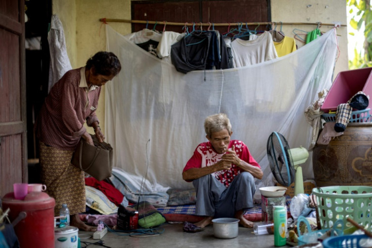 With polls less than two weeks away, Thailand's political parties are promising to help low-income families struggling in the face of soaring prices