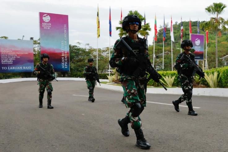 Indonesian security forces patrol at the Komodo International airport ahead of Tuesday's ASEAN meeting in Indonesia