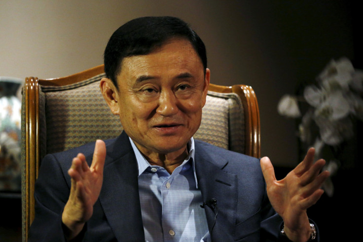 Former Thai Prime Minister Thaksin Shinawatra speaks to Reuters during an interview in Singapore