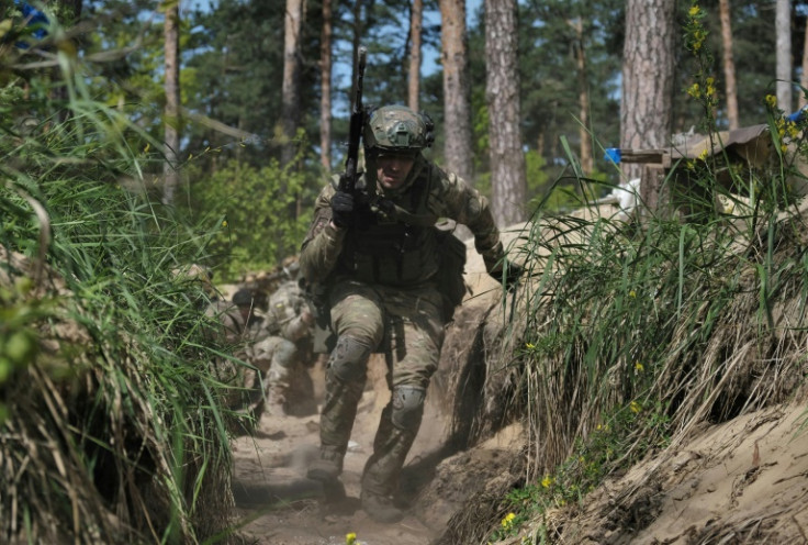 Ukrainian National Guard servicemen take part in military exercises outside Kyiv