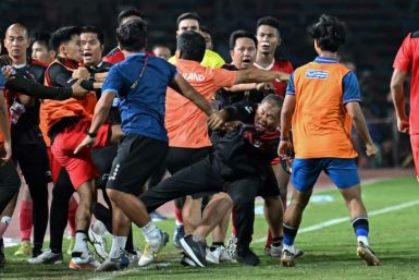 A fight breaks out on the sidelines of the men's football final between Thailand and Indonesia