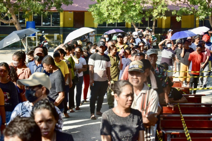 People queue up to vote in parliamentary elections in East Timor on Sunday