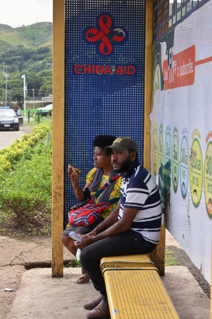 Bus stops with Chinese signage built for the 2018 APEC summit dot Port Moresby's city centre