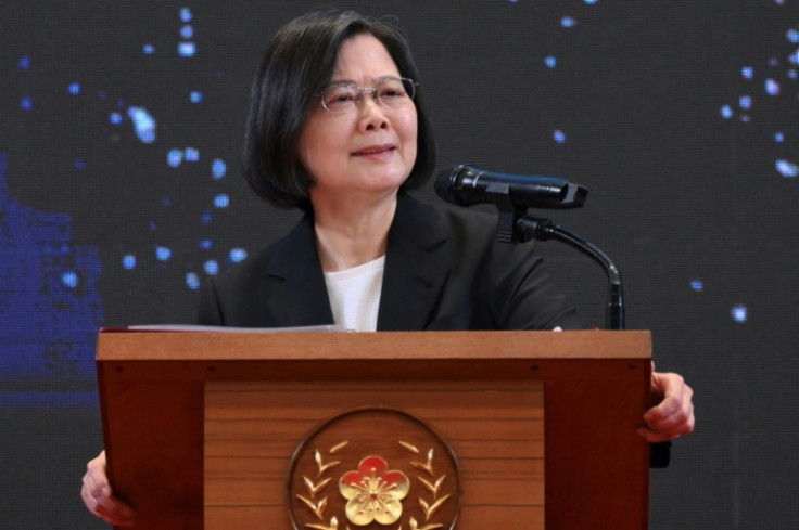 Taiwan's President Tsai Ing-wen vows to maintain peace and stability across the Taiwan Strait in the face of increased military pressure from China