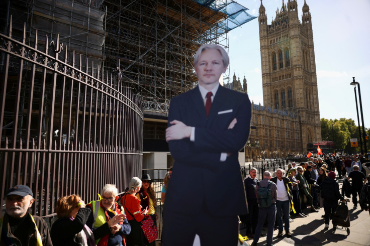 Supporters of WikiLeaks founder Julian Assange create human chain around Westminster in London