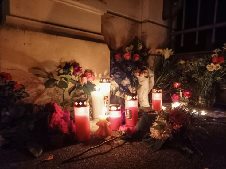Fans lined up to pay tribute at the wrought iron gates of Tina Turner's compound in Kusnacht, on Switzerland's Lake Zurich, many bearing candles and flowers