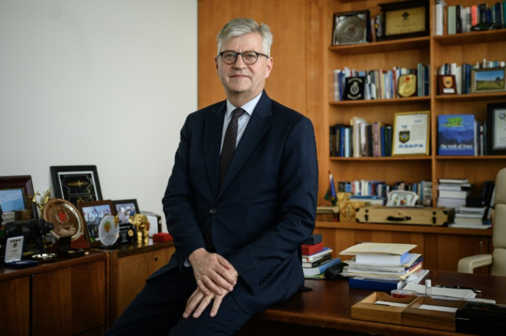 United Nations Under-Secretary-General for Peace Operations Jean-Pierre Lacroix poses for a photo in his office at the UN headquarters in New York City on May 23, 2023