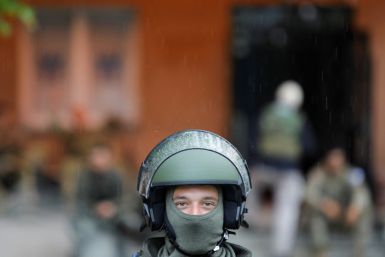 A member of the NATO-led Kosovo Force (KFOR) stands guard in Zvecan