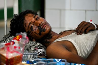 A wounded survivor rescued from the carriage wreckage of a three-train collision near Balasore, gets treated at a government hospital on June 3, 2023